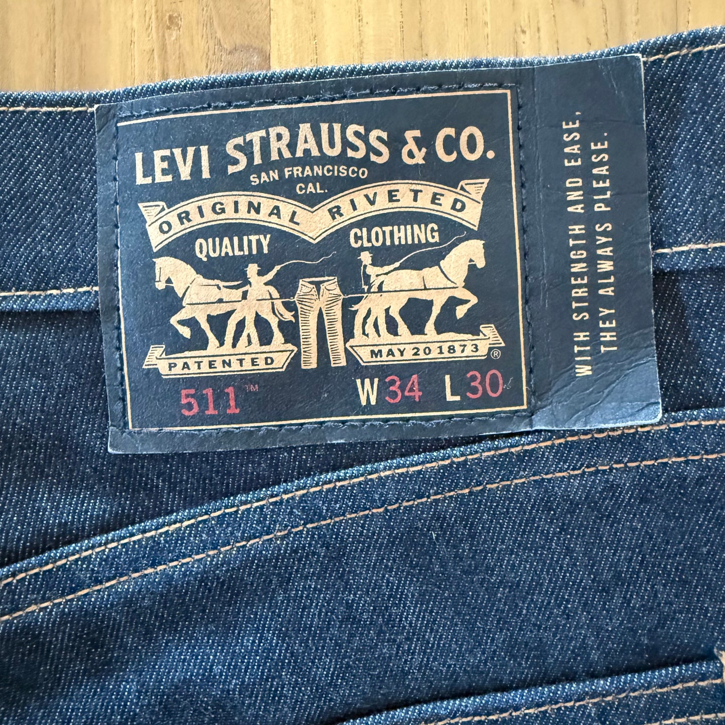 Close-up of Levis label on dark blue 511 skateboard jeans