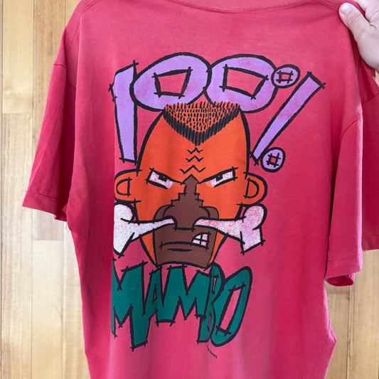 lose-up of irreverent multi-color art print on red vintage Mambo t-shirt