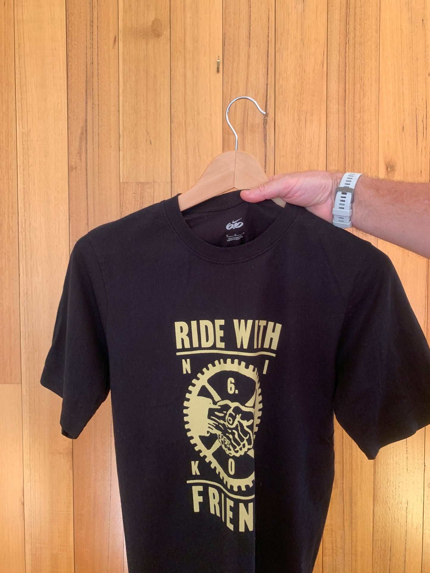 Nike 6.0 logo detail on black Ride with Friends action sports t-shirt