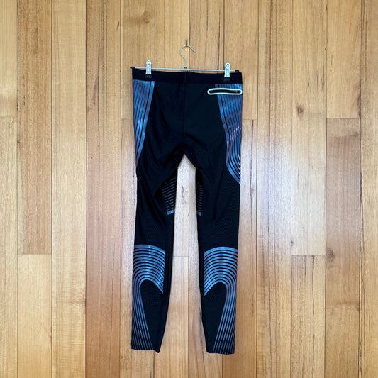 Nike Running Dri-FIT Power Speed Tights in black showing back design with iridescent accents
