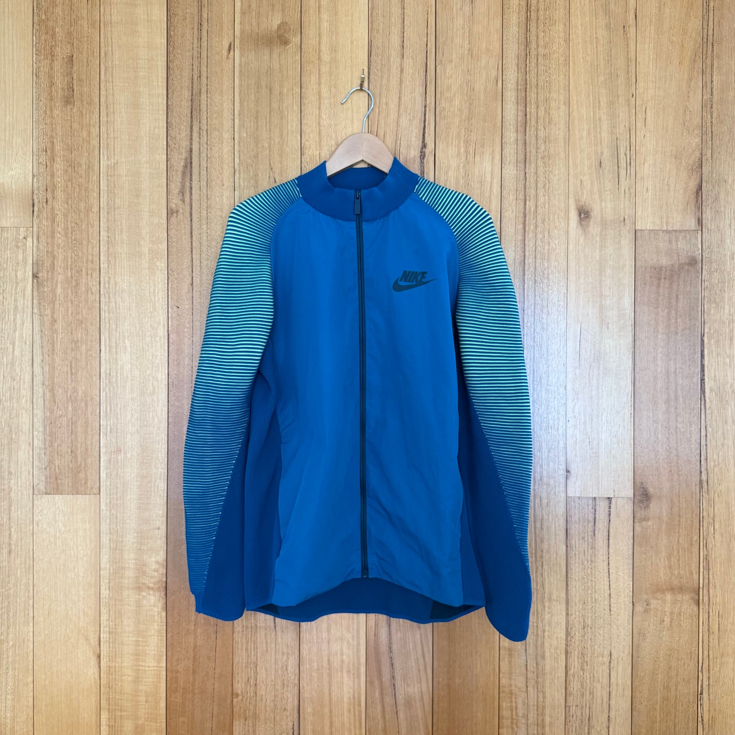 Nike Tech Knit Dynamic Reveal Jacket in turquoise with volt accents - front view