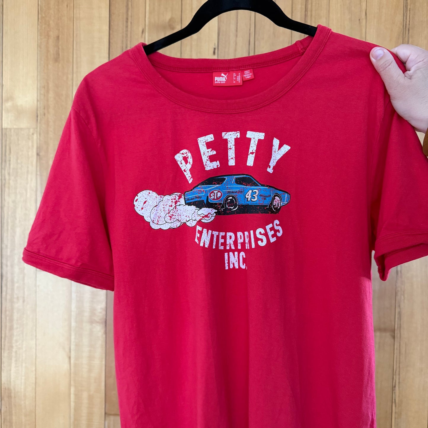 Puma label detail on red Richard Petty STP racing t-shirt