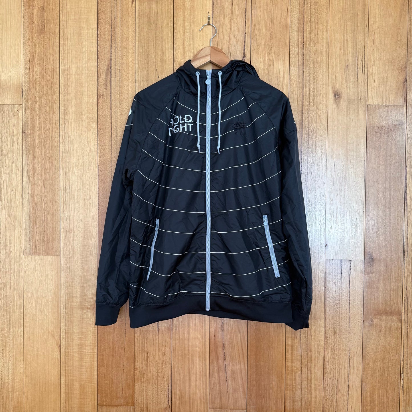 Nike Sportswear x Ben Drury Hold Tight Windrunner Jacket with carry bag