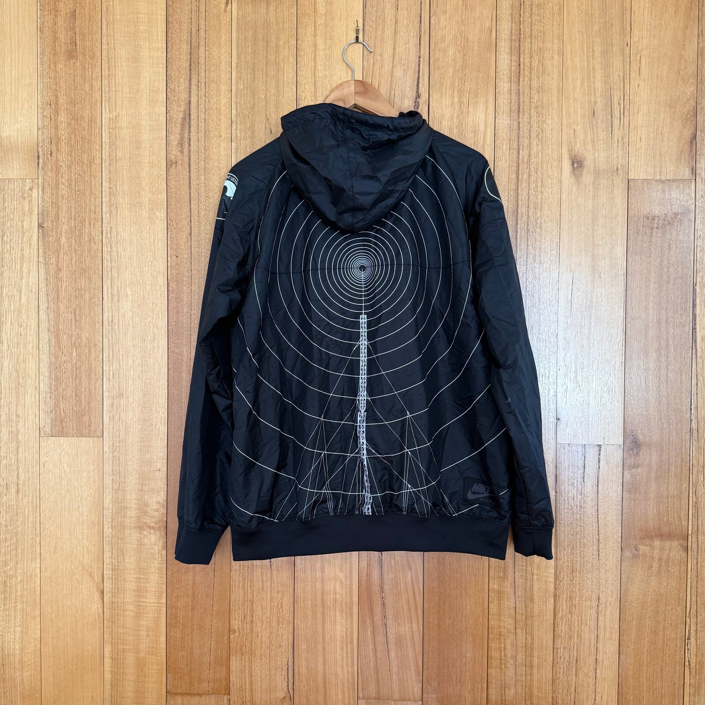 Nike Sportswear x Ben Drury Hold Tight Windrunner Jacket with carry bag