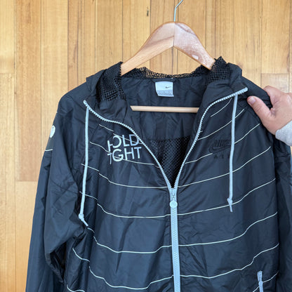 Nike Sportswear x Ben Drury Hold Tight Windrunner Jacket with carry bag