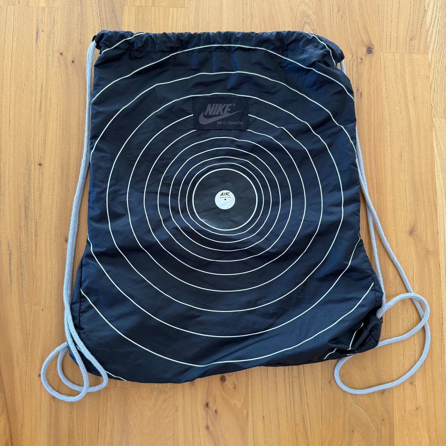 Nike Sportswear x Ben Drury Hold Tight Windrunner Jacket with carry bag