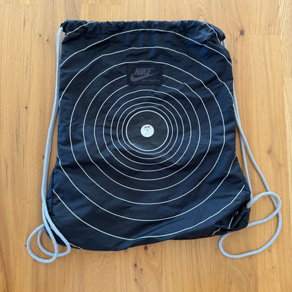 Nike Sportswear x Ben Drury Hold Tight Windrunner Jacket with carry bag