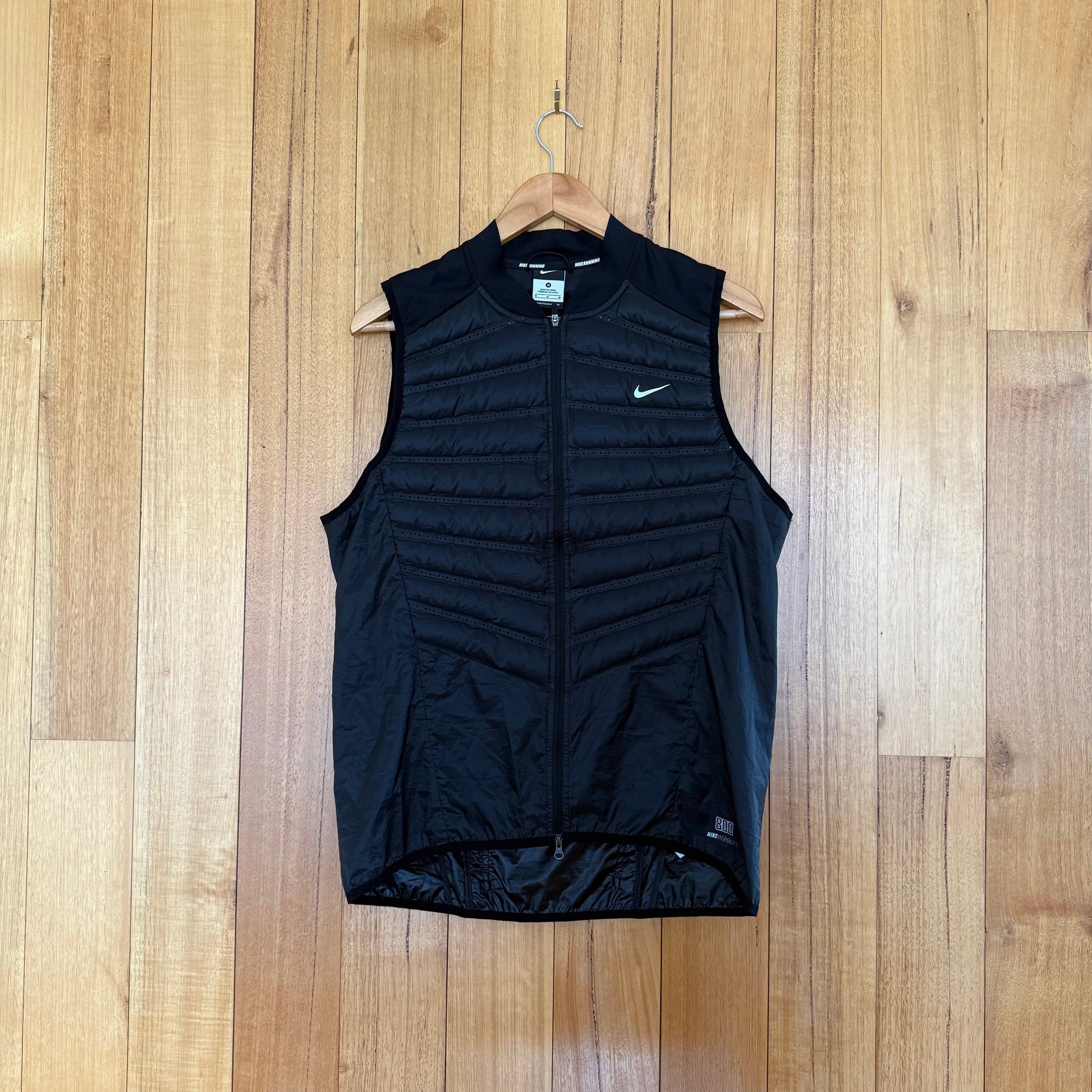 Nike Aeroloft 800 Down full-zip running vest in black with 800-fill down insulation, Fall 2013 release, pre-owned condition