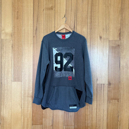 Nike Air 92 Crew Sweatshirt in grey with black, grey, white and red print - front view of Holiday 2016 sweatshirt 802640-071
