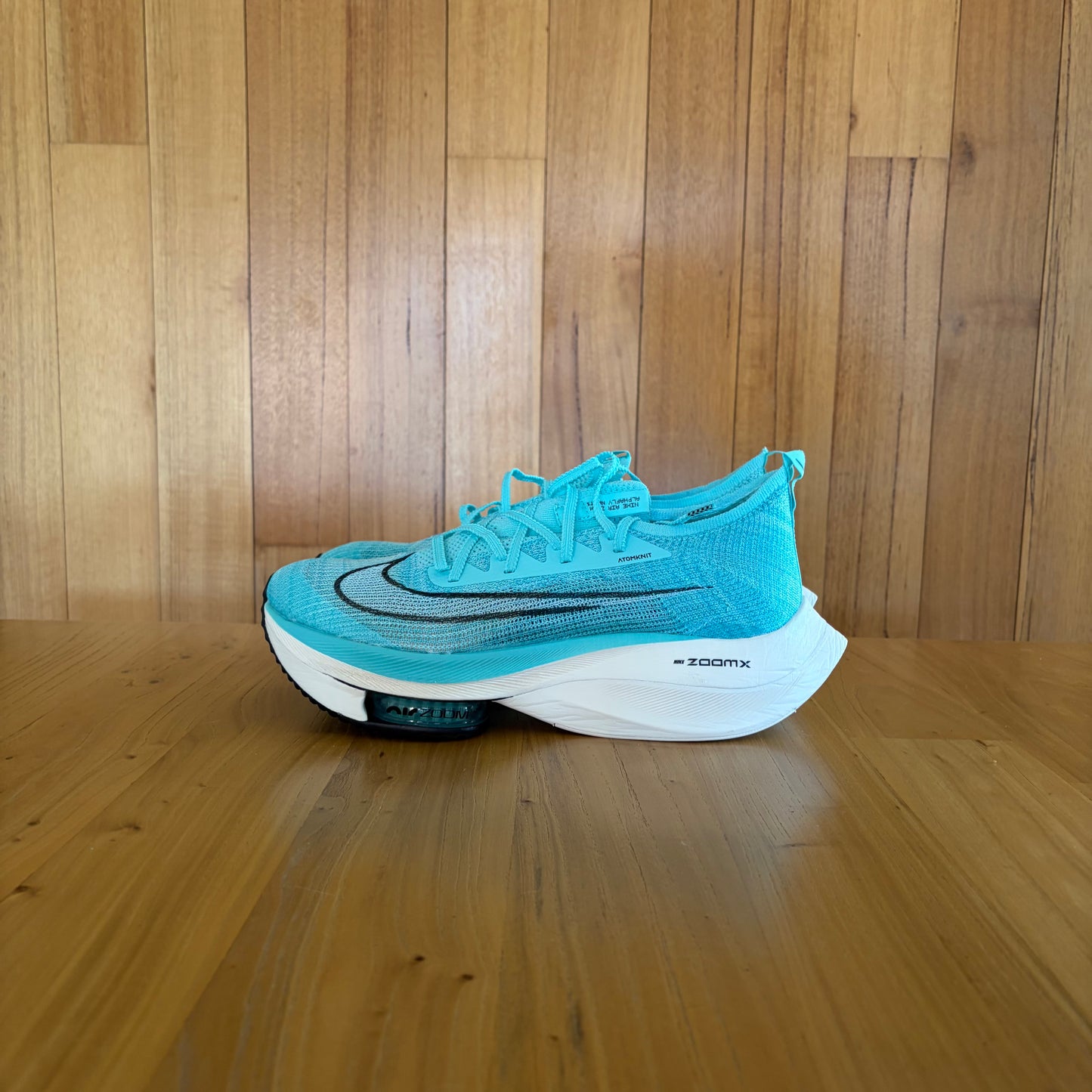 Nike Air Zoom Alphafly Next% running shoe in Hyper Turq, White and Black colorway, new in box condition