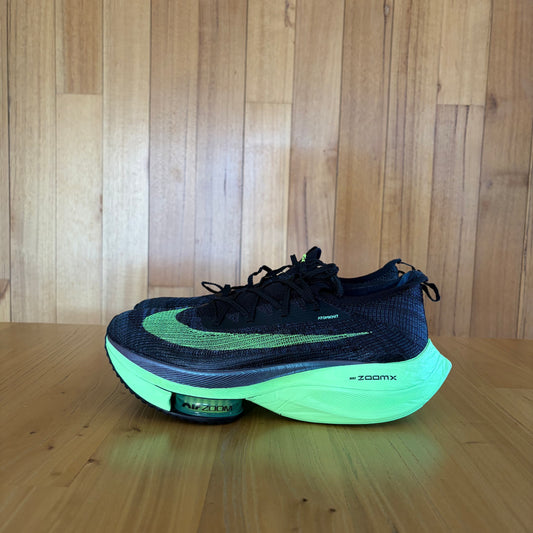 Nike Air Zoom Alphafly Next% in Valerian Blue and Lime Blast colorway, side view showing carbon fiber plate technology