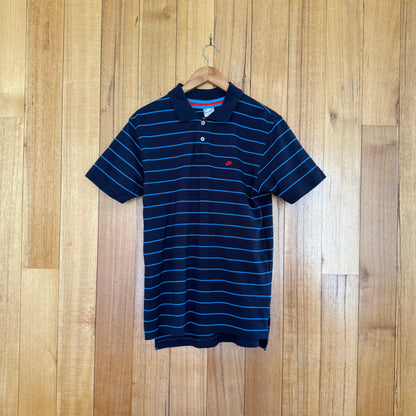 Nike Sportswear blue striped polo shirt with red print detail, 2007 vintage release, pre-owned condition