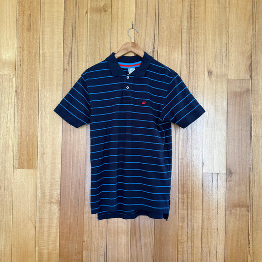 Nike Sportswear blue striped polo shirt with red print detail, 2007 vintage release, pre-owned condition