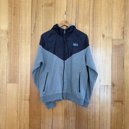 Nike Sportswear Carl Lewis LA 1984 Windrunner hoodie in grey and black with blue multicolor Olympic print, 2007 release, pre-owned condition