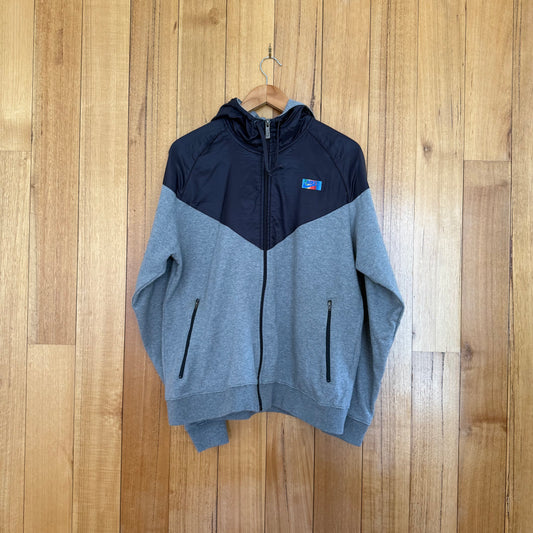 Nike Sportswear Carl Lewis LA 1984 Windrunner hoodie in grey and black with blue multicolor Olympic print, 2007 release, pre-owned condition