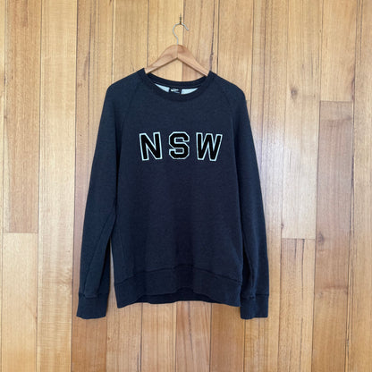 Nike Sportswear NSW Logo Crew sweatshirt in grey with black and white logo print and side pocket, 2000s vintage, pre-owned condition