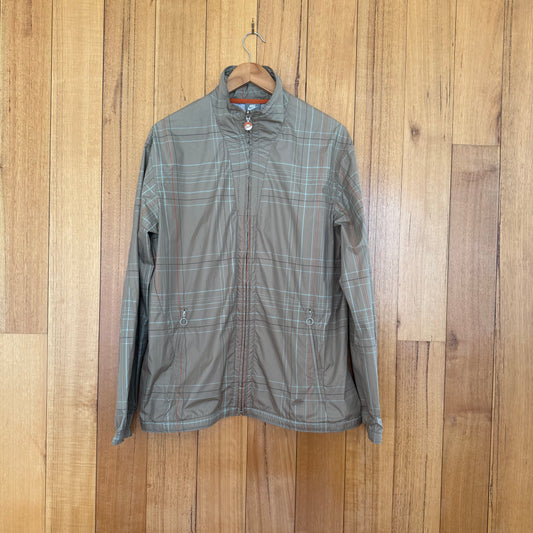 Nike Sportswear rain jacket in brown with blue and orange sneaker print lining, 2007 release, pre-owned condition