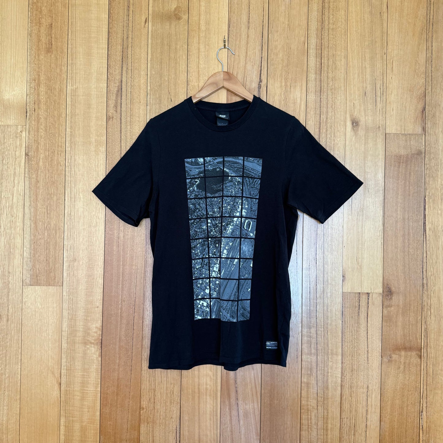 Nike Sportswear Stadium Graphic T-shirt in black with grey and white stadium print, Spring 2010 release, pre-owned condition