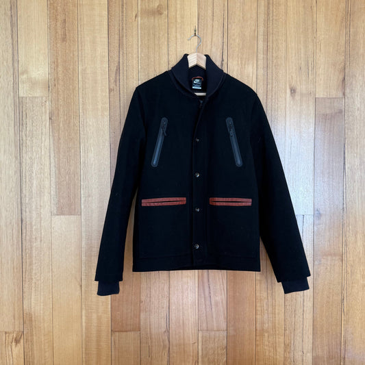 Nike Sportswear wool jacket in black with removable down insert, premium wool construction, Holiday 2012 release, pre-owned condition