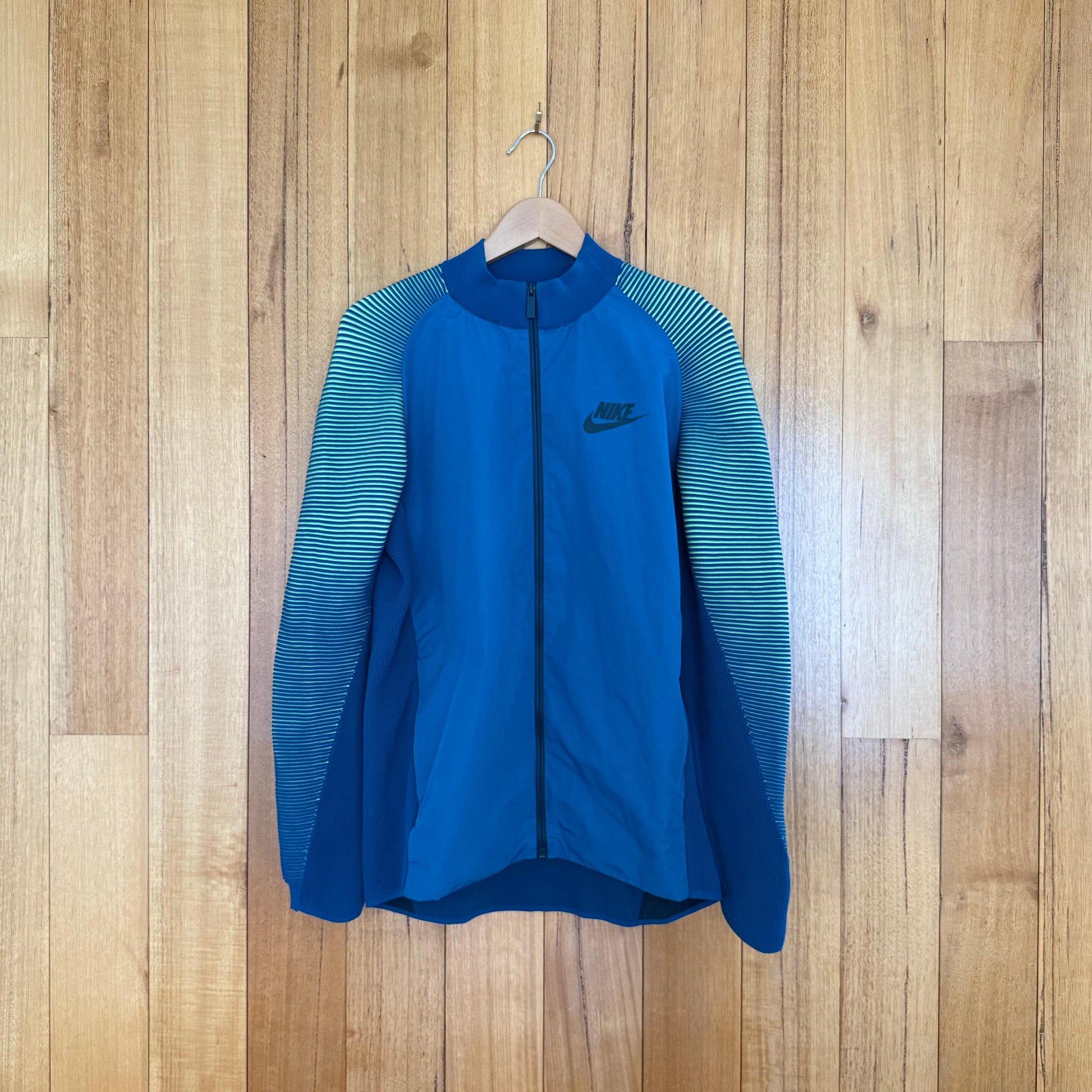 Nike Tech Knit Dynamic Reveal Jacket in turquoise with volt accents - front view
