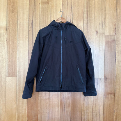 Nike Track & Field oilskin jacket in brown with black print detail, premium oilskin construction, Fall 2012 release, pre-owned condition