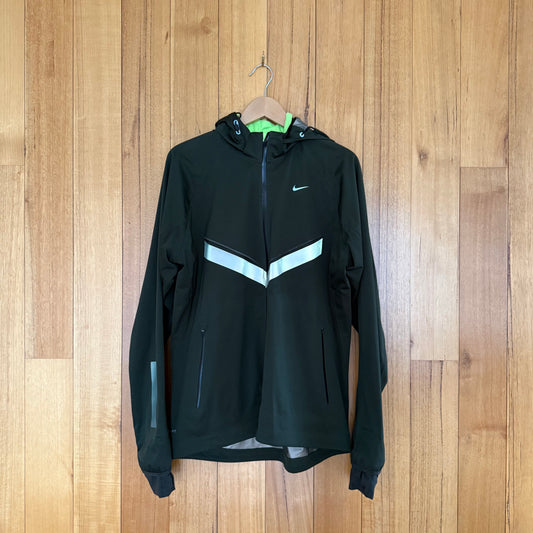 Nike Vapor Storm-Fit Running Jacket in green with reflective details - front view