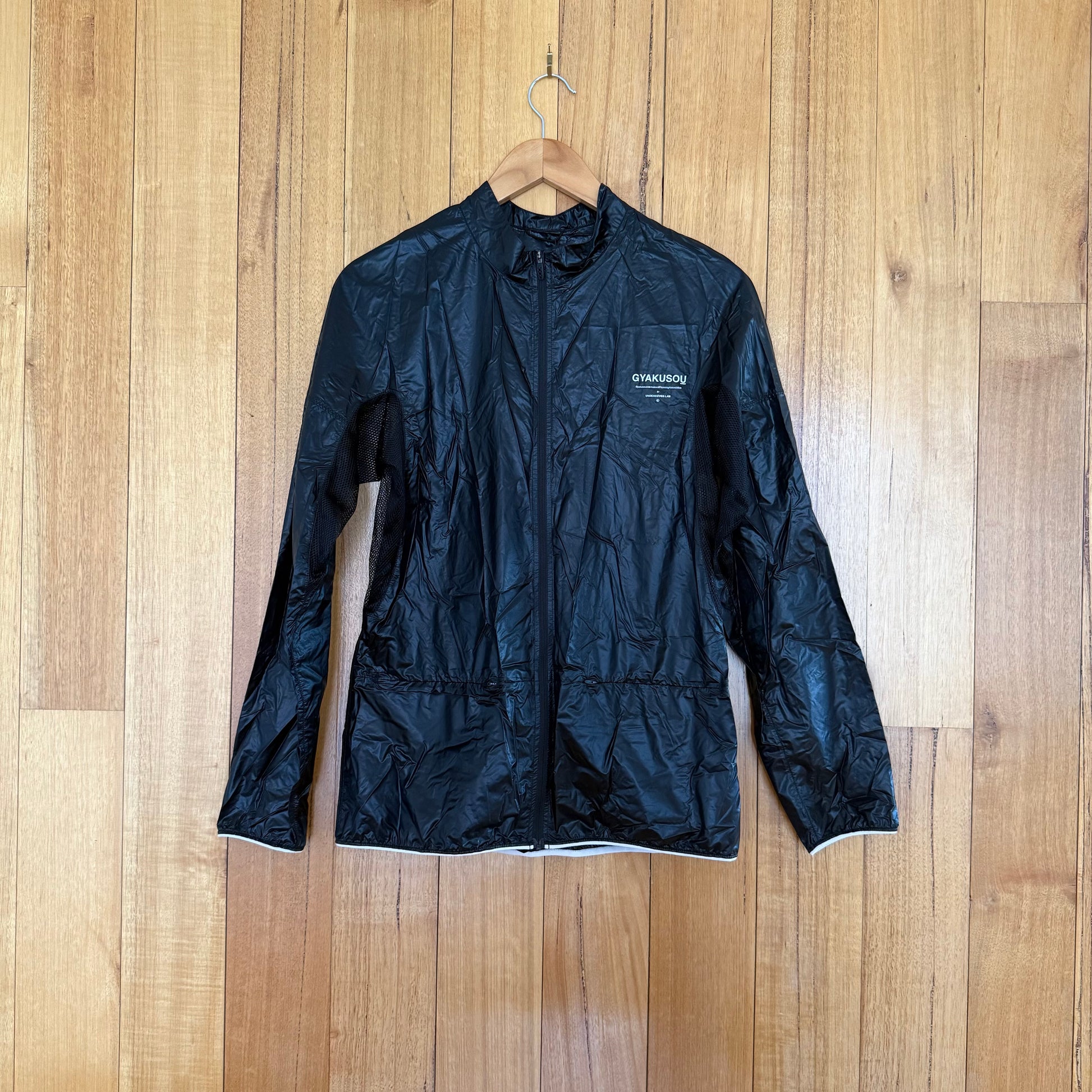 NikeLab x Gyakusou women's lightweight running jacket in black with grey print detail, Jun Takahashi Fall 2017 collaboration, new with tags