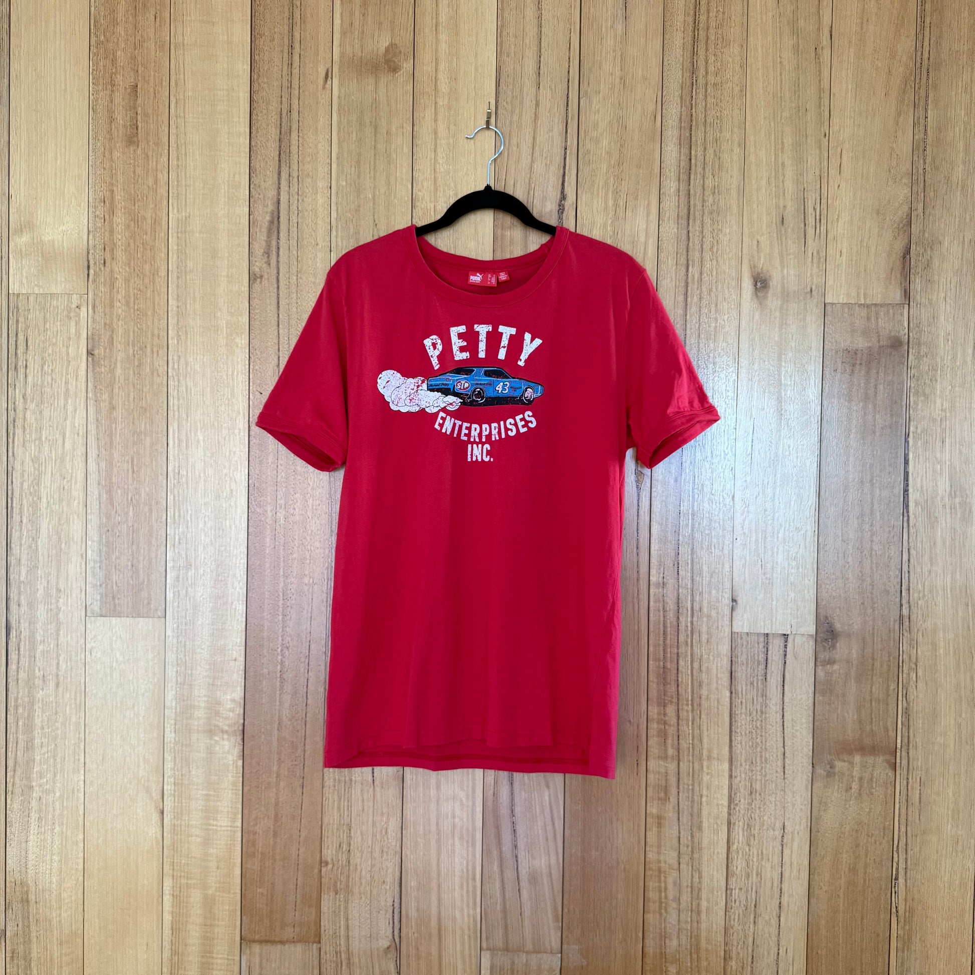 Puma Richard Petty STP Racing T-Shirt in red with blue and white NASCAR graphics - front view